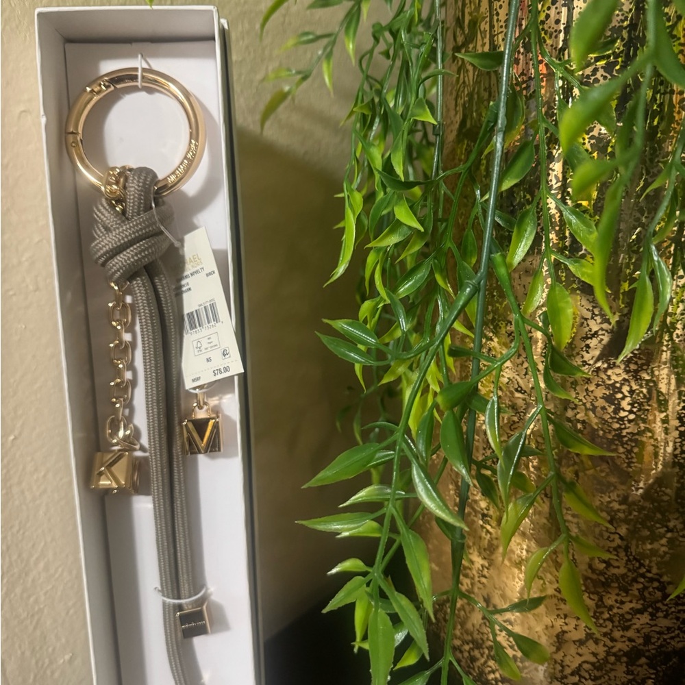 Michael Kors Taupe and Gold Tassel Keychain